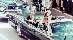 President John F. Kennedy, First Lady Jacqueline Kennedy, and Texas Governor John Connally ride in a motorcade in Dallas, Texas, on November 22, 1963.  Moments later the President and Governor were shot by an assassin. (Walt Sisco / Copyright Bettmann/Corbis / AP Images)